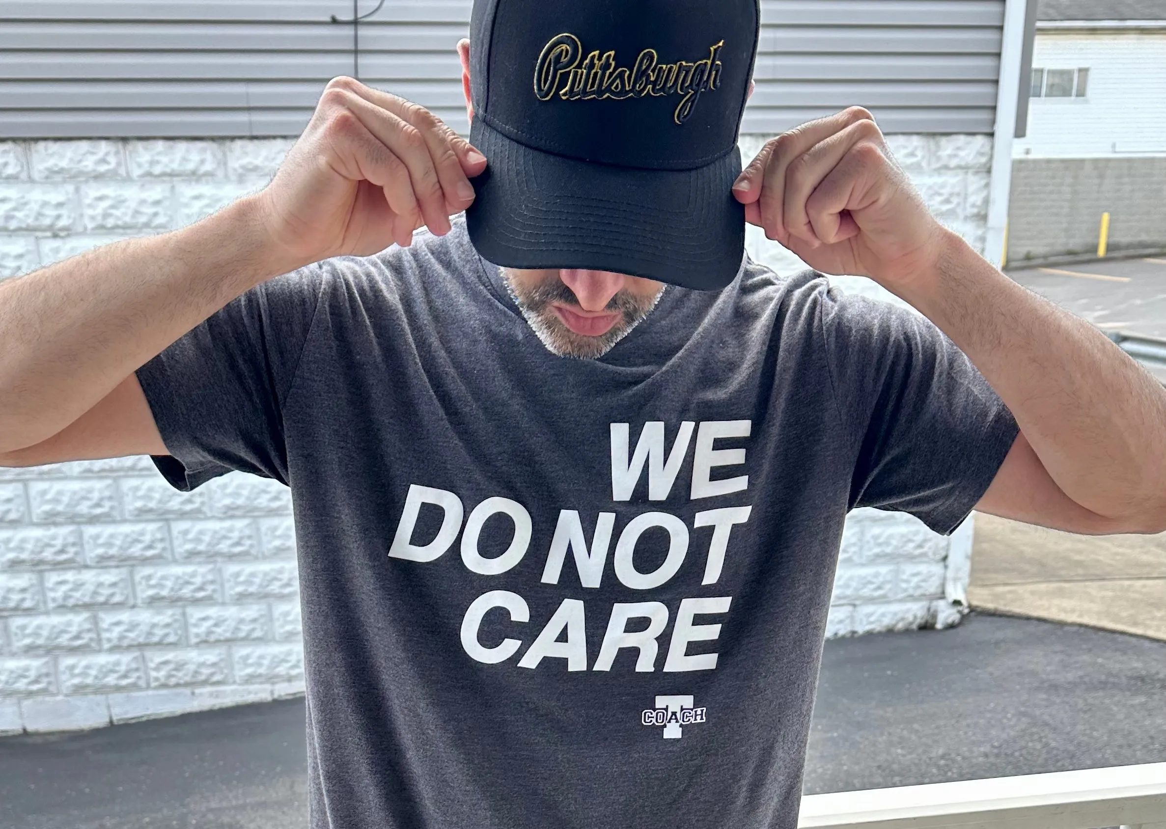 Coach T "We Do Not Care" Tee - Unisex
